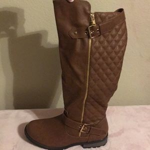 Brown with gold boots